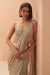 Buy_PARUL GANDHI_Gold Lycra Embellished Sequin Pleated Pre-draped Saree With Corset _Online_at_Aza_Fashions
