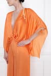 Shop_DILNAZ_Orange Cotton Satin Solid Plunge V Neck Jumpsuit  _at_Aza_Fashions