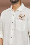 Linen Bloom_White 100% Linen Embroidered Thread Work Dog Motif Shirt_at_Aza_Fashions