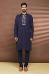 Linen Bloom_Blue 100% Linen Embroidered Thread Work Patola Pattern Placket Kurta _Online_at_Aza_Fashions