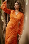 Shop_Ankita Dharman_Orange 100% Viscose Natural Crepe Printed Floral V Neck Flame Lily Drape Dress _Online_at_Aza_Fashions