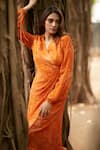 Ankita Dharman_Orange 100% Viscose Natural Crepe Printed Floral V Neck Flame Lily Drape Dress _at_Aza_Fashions