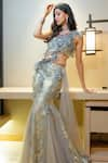 Shop_ANJALEE AND ARJUN KAPOOR_Grey Net Embroidered 3d Asymmetric Pre-draped Saree With Blouse  _at_Aza_Fashions