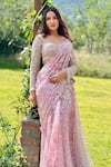 Buy_ANJALEE AND ARJUN KAPOOR_Pink Net Embroidered Floral U Neck Pre-draped Saree With Blouse  _Online_at_Aza_Fashions