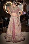 Buy_ANJALEE AND ARJUN KAPOOR_Peach Net Embroidered Geometric V Neck Jaal Bridal Lehenga Set  _at_Aza_Fashions