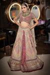 Shop_ANJALEE AND ARJUN KAPOOR_Peach Net Embroidered Geometric V Neck Jaal Bridal Lehenga Set  _at_Aza_Fashions