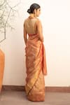 Shop_Priyanka Raajiv_Orange Silk Chanderi Woven Floral Quatrefoil Zahal Saree With Running Blouse_at_Aza_Fashions