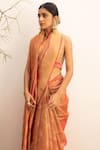 Priyanka Raajiv_Orange Silk Chanderi Woven Floral Quatrefoil Zahal Saree With Running Blouse_Online_at_Aza_Fashions