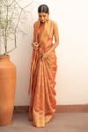 Shop_Priyanka Raajiv_Orange Silk Chanderi Woven Floral Quatrefoil Zahal Saree With Running Blouse_Online_at_Aza_Fashions