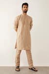 Buy_Son Of A Noble Snob_Beige 100% Linen Cord Textured Stela Kurta_at_Aza_Fashions