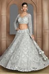 Kalighata_Green Net Sequins, Zari V-neck Scallop Pattern Bridal Lehenga Set _at_Aza_Fashions