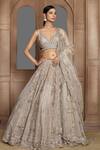 Buy_Kalighata_Gold Organza Sequins, Zari Asymmetric Zardozi Embroidered Bridal Lehenga Set _at_Aza_Fashions