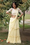 Buy_House of Tushaom_Yellow Georgette Embroidery Sequin Round Tiered Lehenga Blouse Set _at_Aza_Fashions