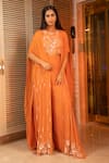 Buy_Harshita Jain_Orange Silk, Chiffon Sequins, Cut Work Embroidered Asymmetric Cape Pant Set _at_Aza_Fashions