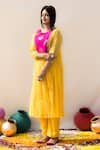 Shop_Mithi Supari_Yellow Chanderi, Cotton Sequins, Zari Basanti Yoke Embroidered Tunic And Pant Set _at_Aza_Fashions