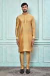 Shop_Aryavir Malhotra_Gold Cotton Art Silk Plain Solid Kurta And Chikoo Churidar Set _Online_at_Aza_Fashions