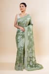 Buy_TaBa Kashi By Artika Shah_Green Crepe Woven Flower Pattern Saree With Unstitched Blouse Fabric  _at_Aza_Fashions