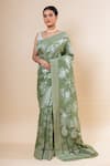 Buy_TaBa Kashi By Artika Shah_Green Crepe Woven Flower Pattern Saree With Unstitched Blouse Fabric  _Online_at_Aza_Fashions