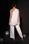 Shop Kyra By Nina + Deepika Ivory Embroidery One Shoulder The White Goddess Hand Painted Top And Pant Set at Aza Fashions Shop_Kyra By Nina + Deepika_Ivory Embroidery One Shoulder The White Goddess Hand Painted Top And Pant Set _at_Aza_Fashions