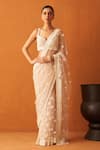 Buy_Angad Singh_Peach Net Embroidery Cutdana Sweetheart Neck Sequin Saree With Blouse _at_Aza_Fashions