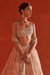 Shop_Angad Singh_Peach Raw Silk Embroidery Mirror Scoop Neck Chevron Pattern Bridal Lehenga Set _Online_at_Aza_Fashions