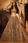 Buy_Kalighata_Gold Organza Hand Embroidered Cut Paisley Sequin Bridal Lehenga Set  _at_Aza_Fashions