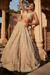 Kalighata_Ivory Net Hand Embroidered Chid Leaf Vanya Sequin Bridal Lehenga Set  _Online_at_Aza_Fashions