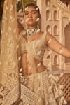 Shop_Kalighata_Ivory Net Hand Embroidered Chid Leaf Vanya Sequin Bridal Lehenga Set  _Online_at_Aza_Fashions