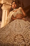 Kalighata_Ivory Net Hand Embroidered Chid Leaf Vanya Sequin Bridal Lehenga Set  _at_Aza_Fashions