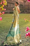 Shop_Rajiramniq_Green Crepe Printed Striped Saree With Unstitched Blouse Fabric _at_Aza_Fashions