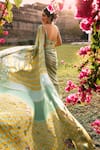 Rajiramniq_Green Crepe Printed Striped Saree With Unstitched Blouse Fabric _Online_at_Aza_Fashions