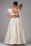 Shop Shruti S Off White Net Sequins, Zari Square Floral Bloom Embroidered Lehenga With Blouse at Aza Fashions Shop_Shruti S_Off White Net Sequins, Zari Square Floral Bloom Embroidered Lehenga With Blouse _at_Aza_Fashions