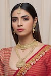 Buy_Samyukta Singhania_Gold Plated Stones Floral Motif Carved Necklace Set _at_Aza_Fashions