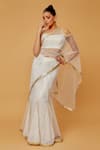 Buy_Anita Kanwal_White Net Embellished Sequin Cold Shoulder Pallu Pre-draped Saree With Blouse _at_Aza_Fashions
