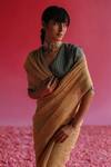 Taisha_Green Kota Doria, Silk Embroidery V-neck Kadhwa Woven Blouse _at_Aza_Fashions