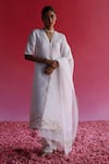 Buy_Taisha_White Kurta Pure Linen Silk Handloom Woven Zari V Neck Palash Border Set _at_Aza_Fashions