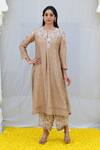 Buy_Label Niti Bothra_Ivory Banaras Silk Base Embroidered Resham Round Kurta And Palazzo Set_at_Aza_Fashions