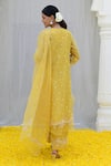 Shop_Label Niti Bothra_Yellow Banaras Silk Base Embroidered Floral Notched Tie-up Kurta Palazzo Set_at_Aza_Fashions
