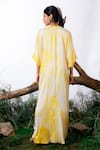 Shop_OMANA BY RANJANA BOTHRA_Yellow Modal Satin Shibori V Neck Bead Neckline Embroidered Kaftan _at_Aza_Fashions