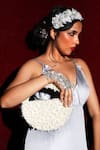 Born Flash_White Embellished Pearl Invasion Handbag _at_Aza_Fashions