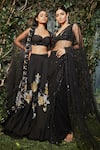 Kashmiraa_Black Organza Hand Embroidered Cutdana Sweetheart Neck Lehenga Set _at_Aza_Fashions