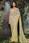 Shop_Kashmiraa_Yellow Net Hand Embroidered Cutdana Blunt V Neck Saree With Blouse _Online_at_Aza_Fashions