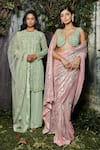 Kashmiraa_Pink Net Hand Embroidered Cutdana Sweetheart Neck Tikki Saree With Blouse _at_Aza_Fashions