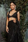 Shop_Kashmiraa_Black Net Hand Embroidered Cutdana Blunt V Neck Saree With Blouse _Online_at_Aza_Fashions