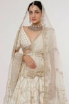 Sanjana Thakur_Ivory Pure Raw Silk Hand Embroidered Aari Plunge V Neck And Bridal Lehenga Set _at_Aza_Fashions