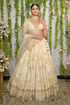 Buy_Sanjana Thakur_Ivory Blouse And Lehenga Pure Raw Silk Hand Embroidery Floral Deep V Bridal Set _at_Aza_Fashions