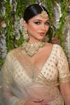 Shop_Sanjana Thakur_Ivory Blouse And Lehenga Pure Raw Silk Hand Embroidery Floral Deep V Bridal Set _at_Aza_Fashions