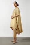 Latha Puttanna Gold Raw Silk Embroidered Mirror Round Asymmetric Kurta And Pant Set at Aza Fashions Latha Puttanna_Gold Raw Silk Embroidered Mirror Round Asymmetric Kurta And Pant Set _at_Aza_Fashions
