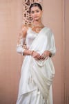Tarun Tahiliani_Ivory Satin Crystals Round Neck Concept Saree With Embroidered Blouse_Online_at_Aza_Fashions