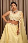 Shloka Sudhakar_Yellow Raw Silk Embroidery Pearls Tear Drop Neck Lehenga Set _Online_at_Aza_Fashions
